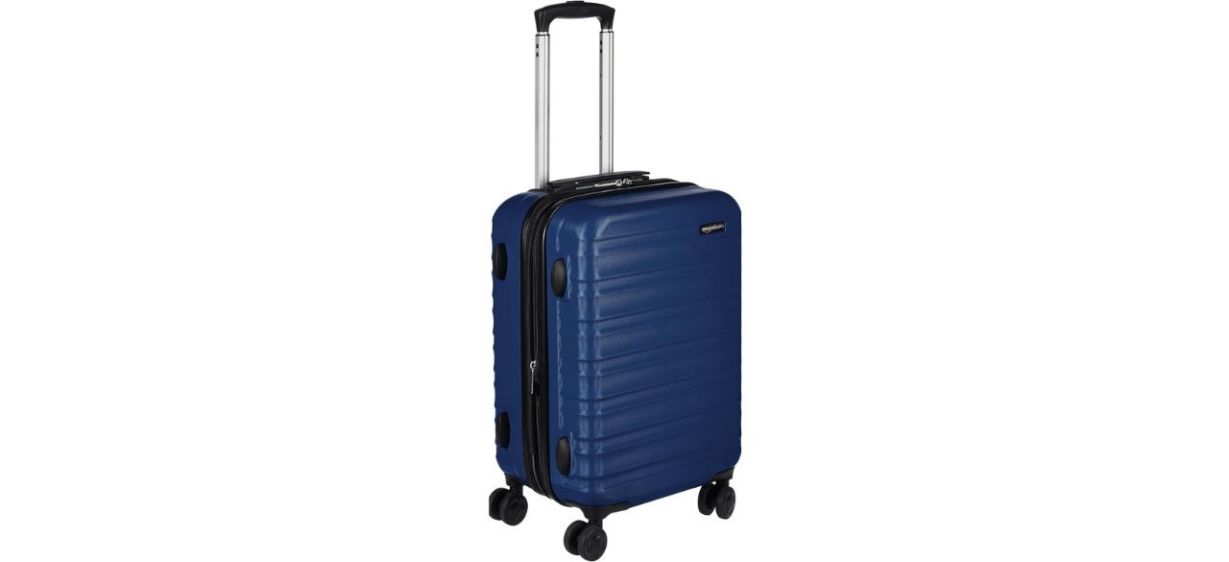 Amazon Basics Expandable Hardside Carry-On Luggage on white back Amazon Basics Expandable Hardside Carry-On Luggage on white back